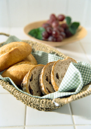 a basket of traditional breakfast, with bread and fruits