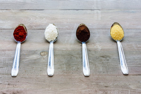 Buckets filled with various spices cookingの写真素材