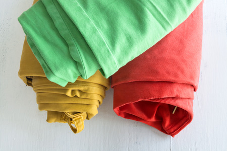 Colored trousers on wooden boardの写真素材
