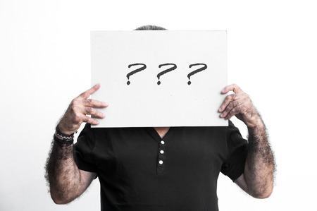man doing all kinds of gestures and emotions with blackboard isolated on white backgroundの写真素材