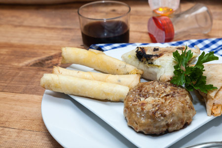 Typical food and fresh Moroccan on wooden table with woven sack