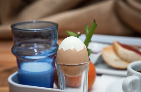 Healthy and light breakfast on wooden boardの写真素材
