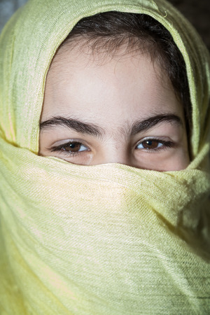 MARCH 1.2015, TANGIER MOROCCO: typical Portrait of young arab woman with veil we can see down any street in Tangier in Morocco and THROUGHOUT the Muslim worldのeditorial素材