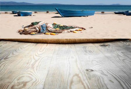 A photo of a wooden table with different backgrounds for any announcementsの写真素材