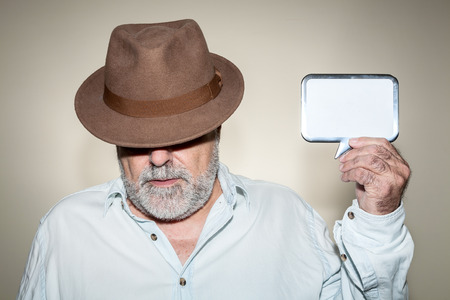 Attractive Senior hat with white beard with hatの写真素材