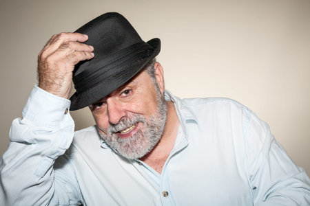 Attractive Senior hat with white beard with hat