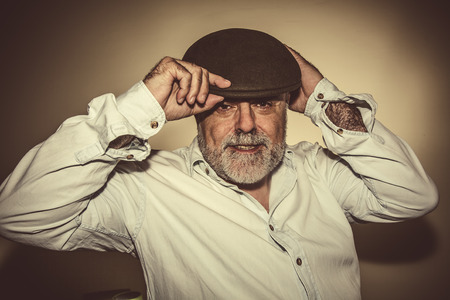 Attractive Senior hat with white beard with hatの写真素材