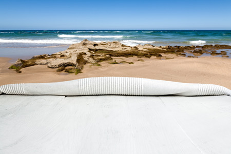 A photo of a wooden table with different backgrounds for any announcementsの写真素材