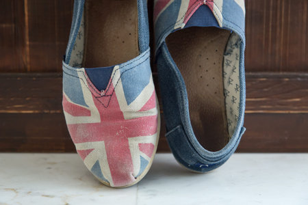 Set of clothes and various accessories for women on old wooden tableの写真素材