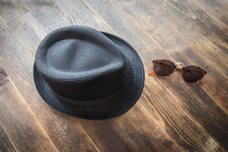 Set of clothes and various accessories for men on old wooden tableの写真素材