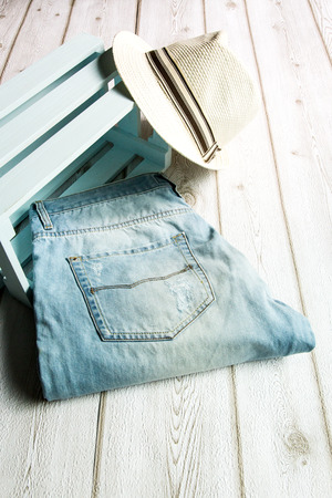 Set of clothes and various accessories for men on old wooden tableの写真素材