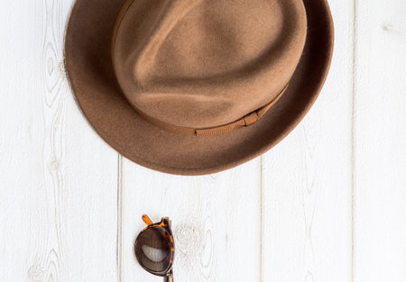 Set of clothes and various accessories for men on old wooden tableの写真素材