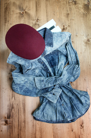 Set of clothes and various accessories for men on old wooden tableの写真素材