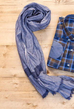 Beautiful Shirt and scarf on old wooden boardの写真素材