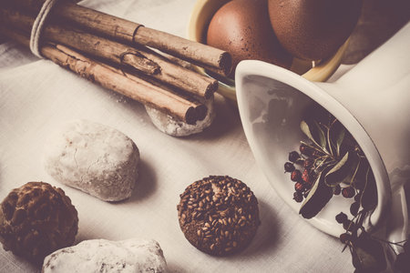Cream and pastries, typical Christmas sweets in Spain with mint and brown eggs