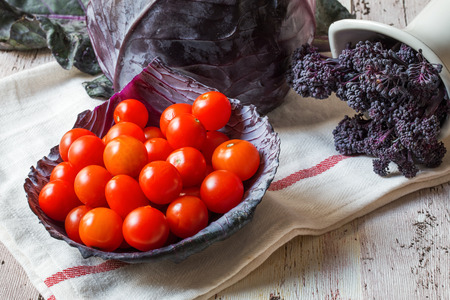 Healthy Fresh small tomatoes with more vegetablesの写真素材