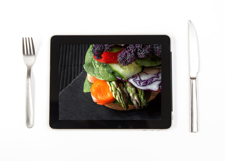 Photo vegan burger on black tablet indoorsの写真素材