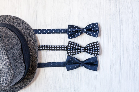 Close-up of Clothing and fashion accessories on wooden tableの写真素材