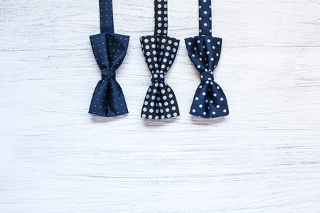 Close-up of Clothing and fashion accessories on wooden tableの写真素材