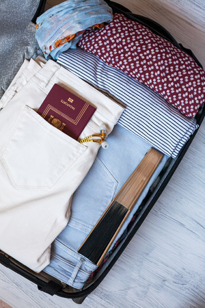 Close-up of Clothing and fashion accessories on wooden tableのeditorial素材
