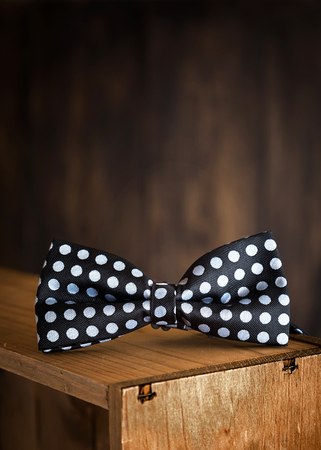 Close-up of Clothing and fashion accessories on wooden tableの写真素材