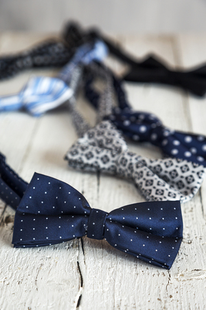 Close-up of Clothing and fashion accessories on wooden tableの写真素材