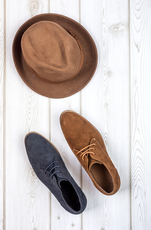 Close-up of Clothing and fashion accessories on wooden table from aboveの写真素材