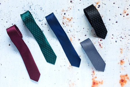 Close-up of Clothing and fashion accessories on wooden table from aboveの写真素材