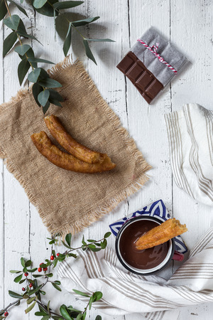 Hot Chocolate with churros with dark backgroundの写真素材