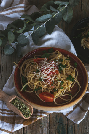 Spaguetti with tomato cheese and oregano, typical italian pastaの写真素材