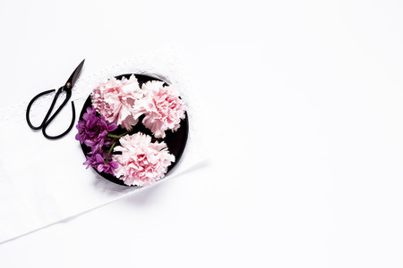 Flowers on white background. Flat lay, top view. Flowers backgroundの写真素材