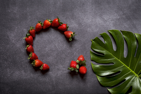 Mix of fresh fruits on black backgroundの写真素材