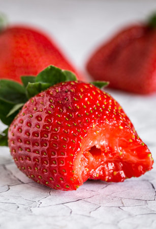 Fresh strawberries on old white wooden table.Detoxの写真素材