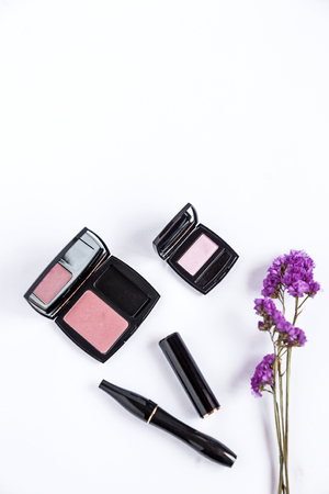 Makeup brush and cosmetics, on a white background isolated, from aboveの写真素材