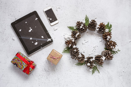 Christmas background with decorations and gift boxes on wooden board. From aboveの写真素材