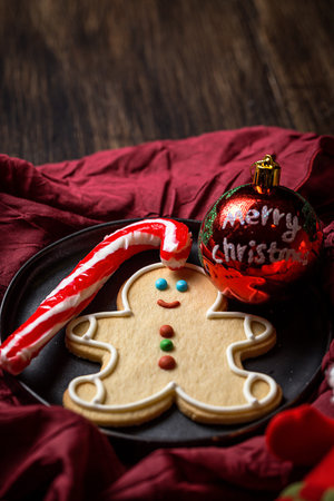 Christmas cookies on wooden table. With Christmas decorations. Copyspace