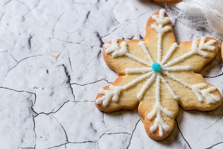 Christmas cookies on wooden table. With Christmas decorations. Copyspace