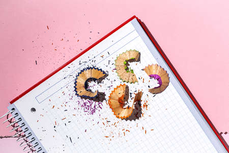 Back to school supplies, notebooks, colored pencils from above. Flat lay. Top viewの写真素材