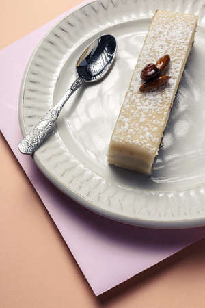 Traditional luxurious French pastries with mint leaves on on colorful backgroundの写真素材