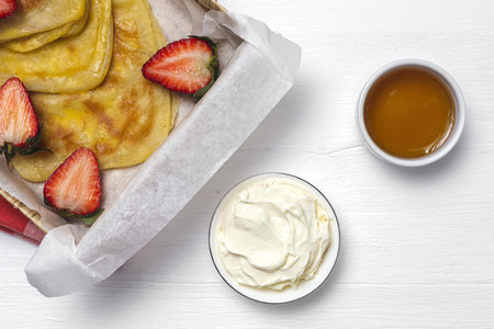 Homemade and traditional Arabic rghaif or msemen with honey and cream cheese. Moroccan Foodの写真素材