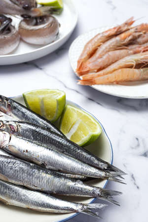 Anchovies, prawns and raw whiting prepared for frying. Typical Spanish food.Healthy foodの写真素材