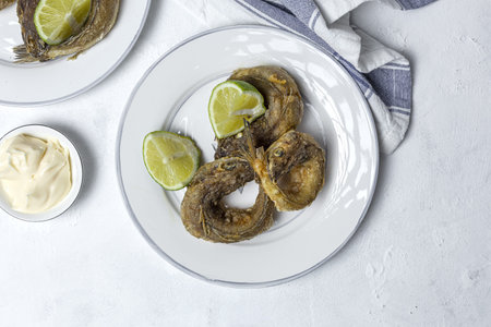 Typical Spanish frying of fried fish with lemon.Spanish food.Healthy food concept