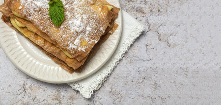 Homemade arabic cake with filo pastry and pastry cream from above. Arabic food