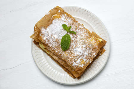 Homemade arabic cake with filo pastry and pastry cream from above. Arabic foodの写真素材