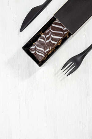 Traditional chocolate Millefoglie or French mille-feuille on white background with copy spaceの写真素材
