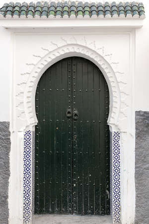 Arab architecture in the old medina. Streets, doors, windows, details. Tangier, Moroccoの写真素材