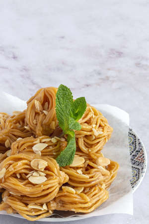Homemade chebakias pastries, typical Moroccan sweets with honey for Ramadan and aid. halal foodの写真素材