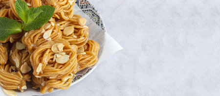 Homemade chebakias pastries, typical Moroccan sweets with honey for Ramadan and aid. halal foodの写真素材