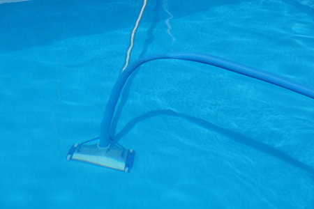 pool cleaner with tube to clean the bottom of a swimming pool.の写真素材