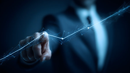 Businessman touching virtual increasing graph representing business growth, stock market, investment or other financial conceptの素材